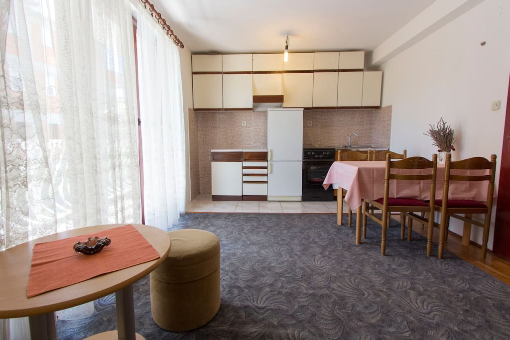 Kitchen andthere is one single bed in the same space