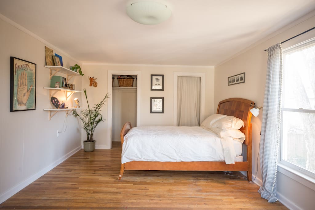 The rock room has a queen size bed with a down comforter and a closet for hanging your things.