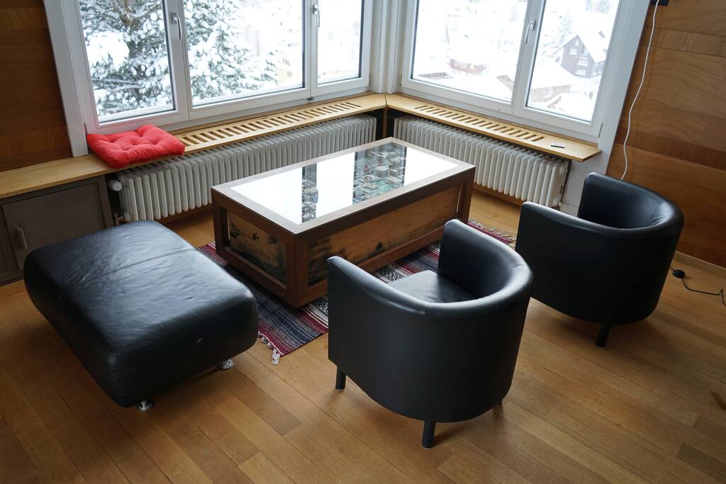 Living room with an amzing view over Andermatt