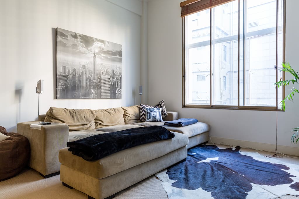 Lounge around with great natural light in the living room