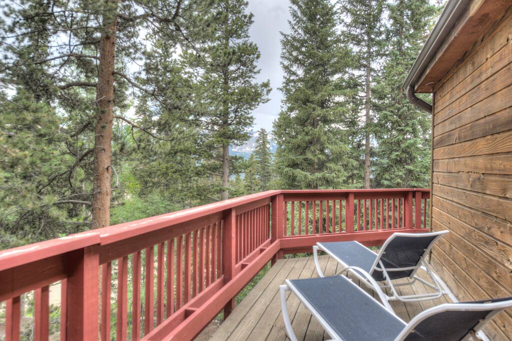 Look out over the pines from a private balcony.