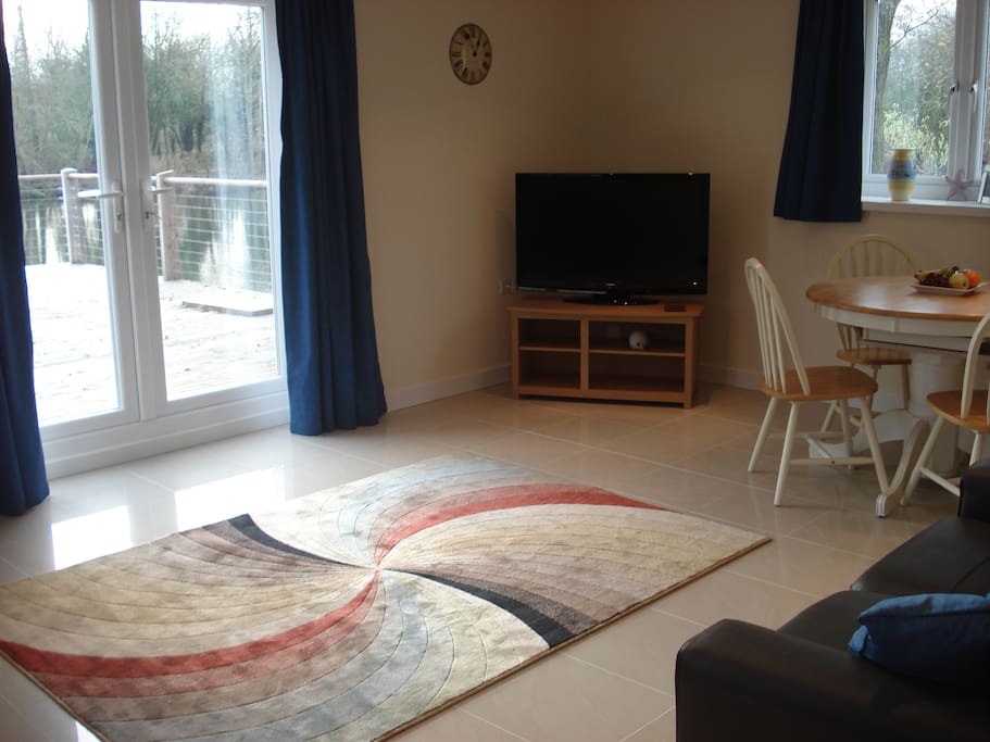 The living room with a glimpse of the lake