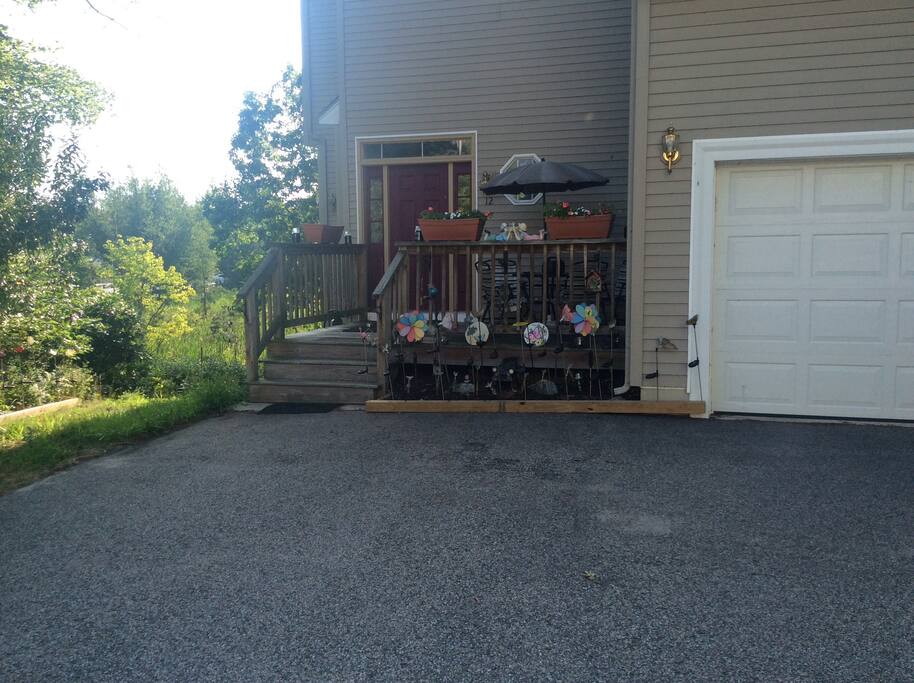 Front deck for our guests. Looks over webster lake. Enjoy breakfast on the deck or quiet time