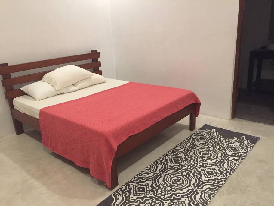Queen sized bed. Extra mattress available