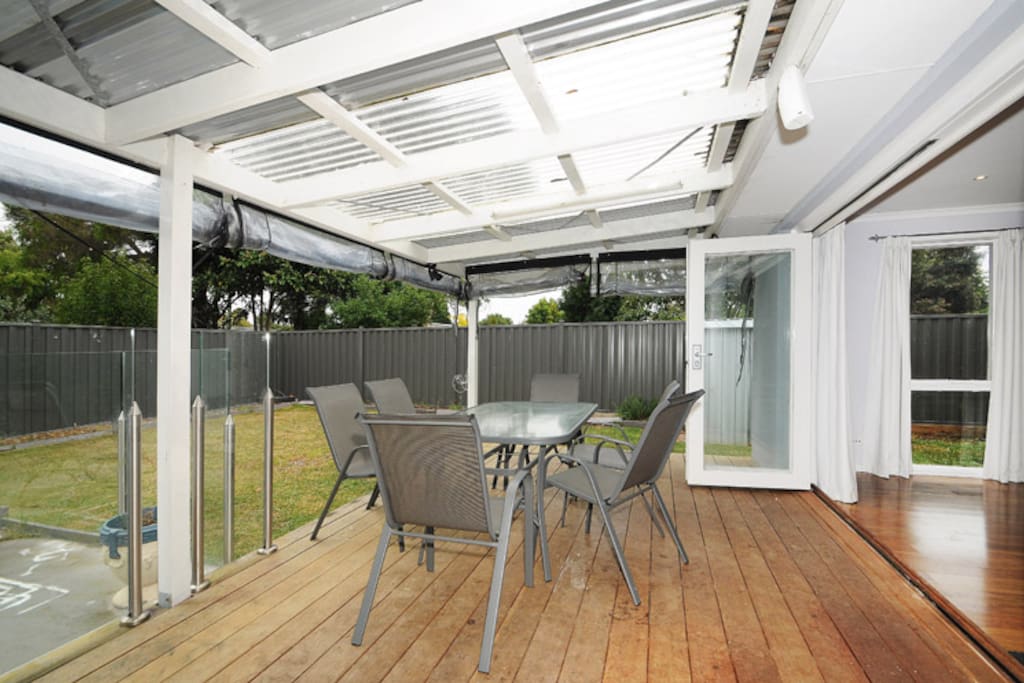 Undercover decked area next to pool