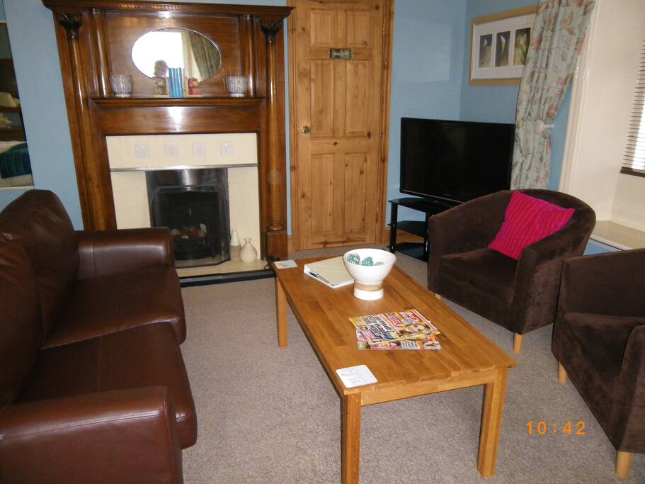 Seating area in the rooms with 40 inch tv