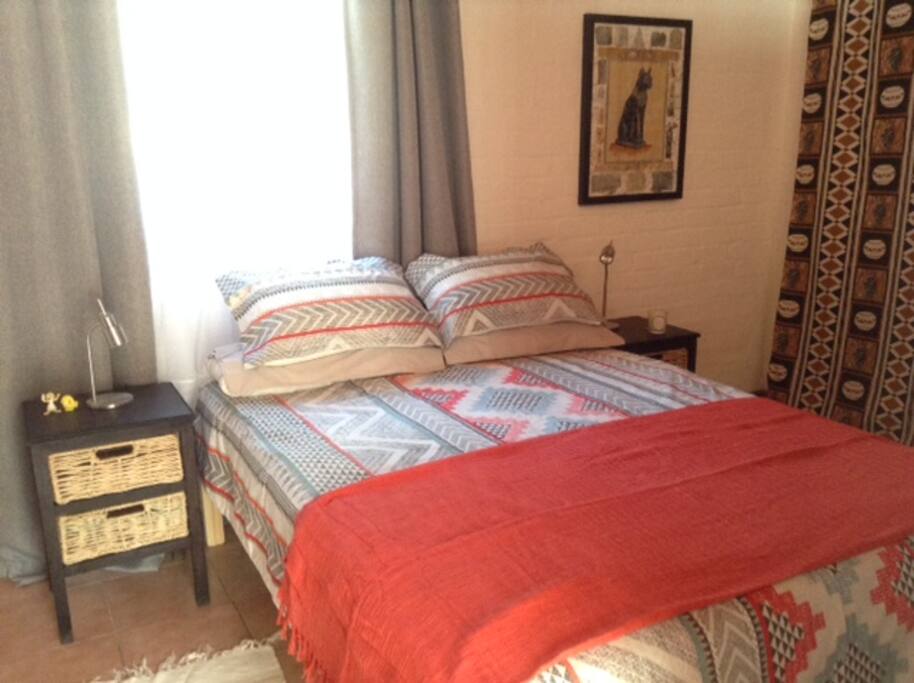 Bright spacious bedroom with en-suite shower room and new double bed.