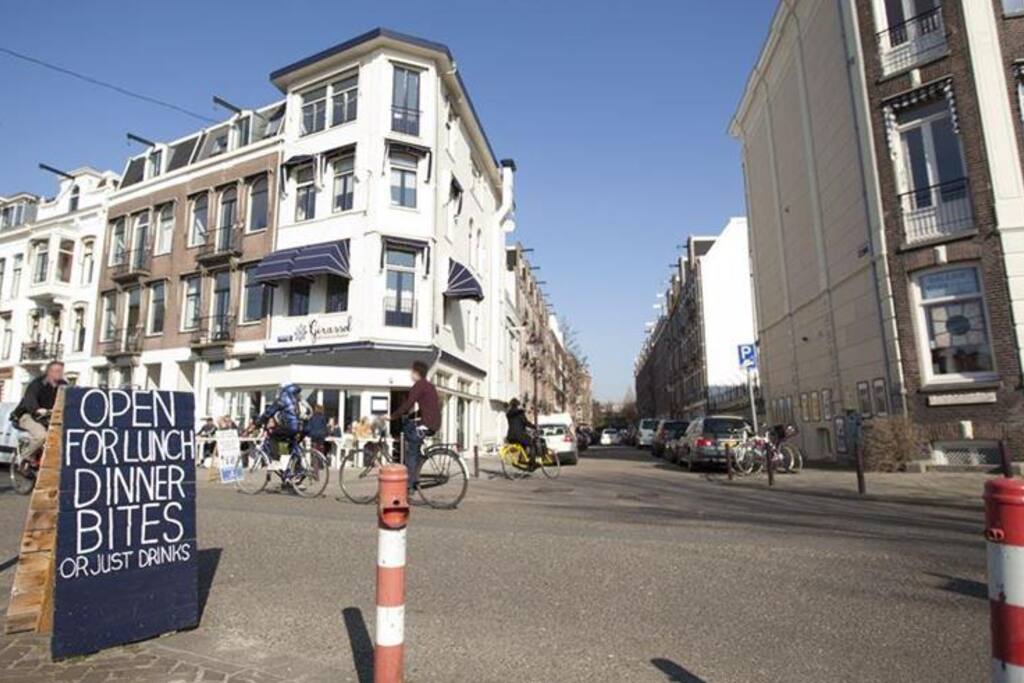 My apartment is at the beginning of this street. Opposite this picture is the Amstel river. At the left you will see two nice terraces.