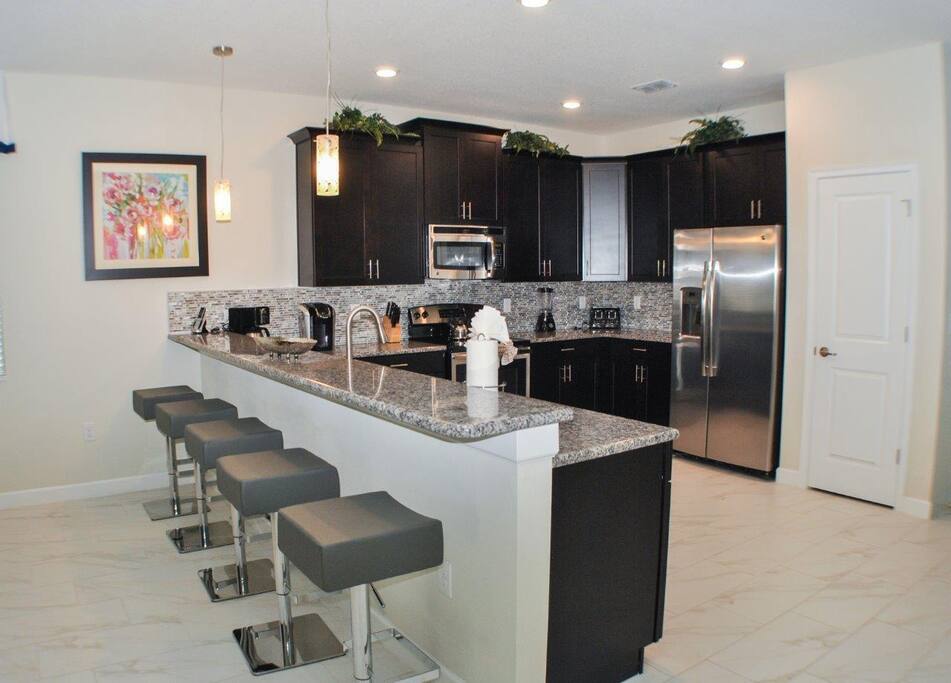 Chef's Kitchen with Bar seating for 5.