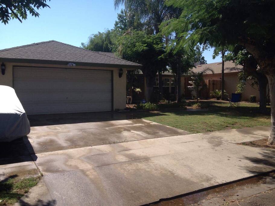 Our Home with plenty of shade. Various Plants and trees.