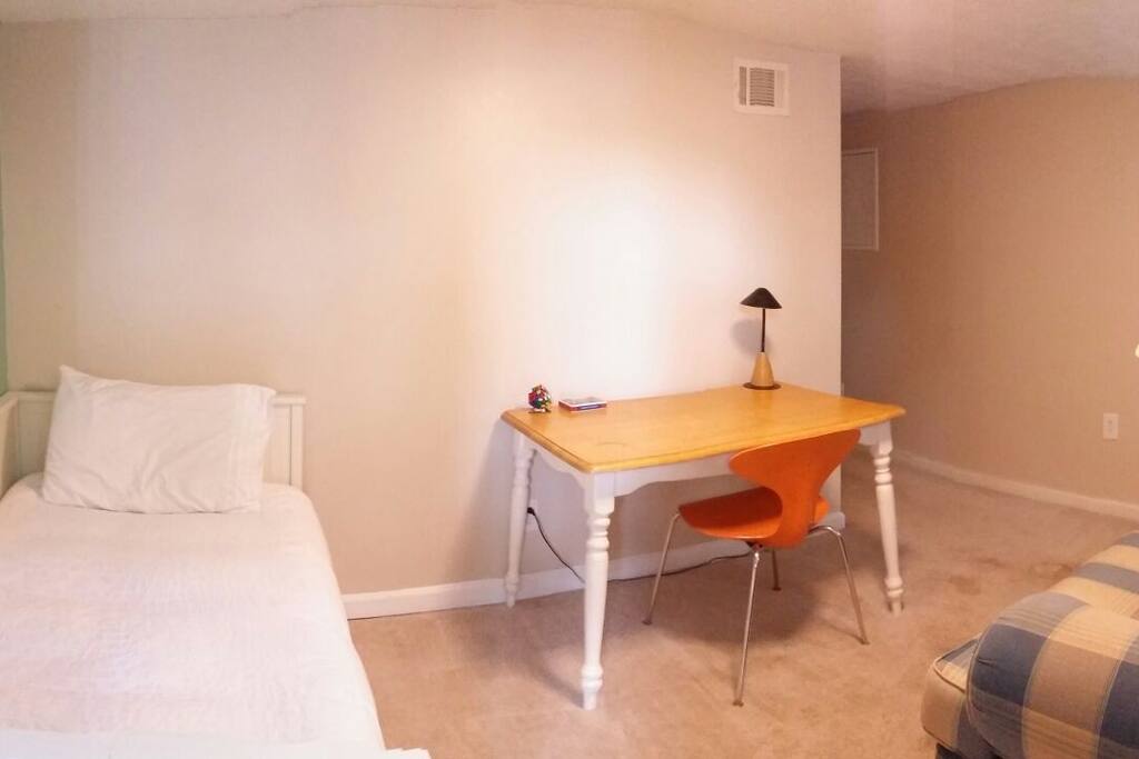 Daybed in front room pulls out to double, couch pulls out to queen bed