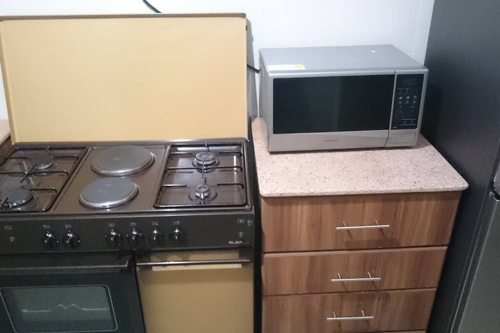 Enjoy or cook meals in the fully equipped Kitchen.
