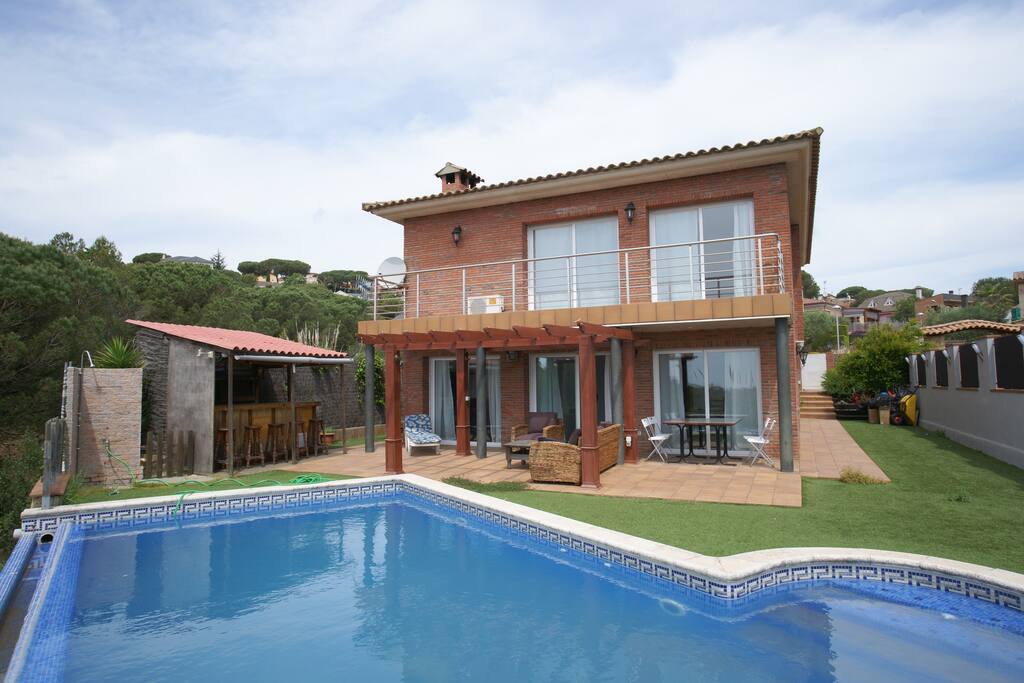 Front view, pool area, bar area, patio