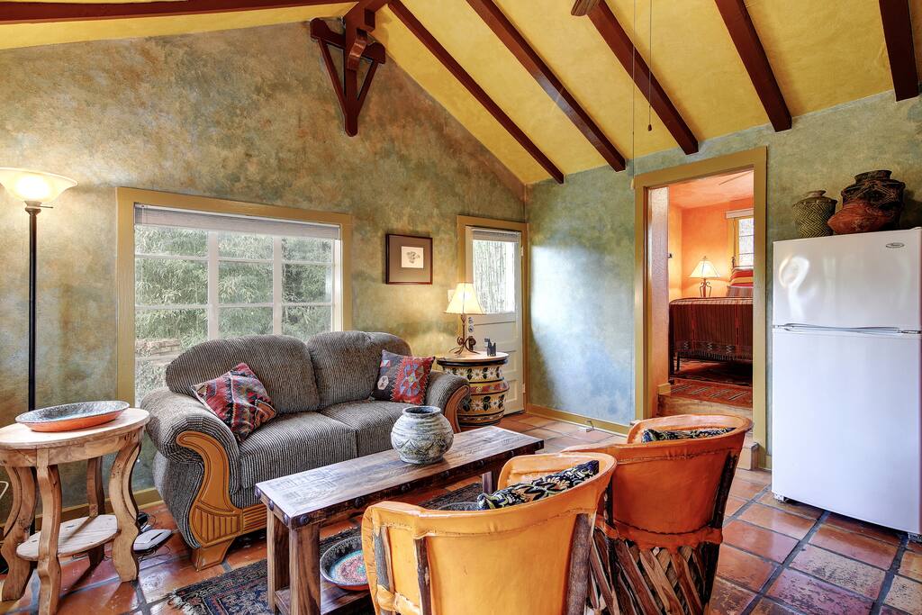 Living room with two arm chairs and plush love seat