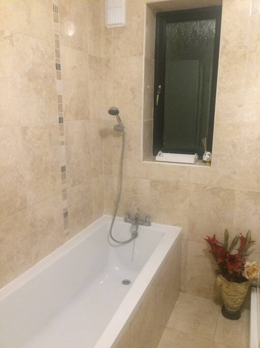 Private bathroom with both Bath and shower