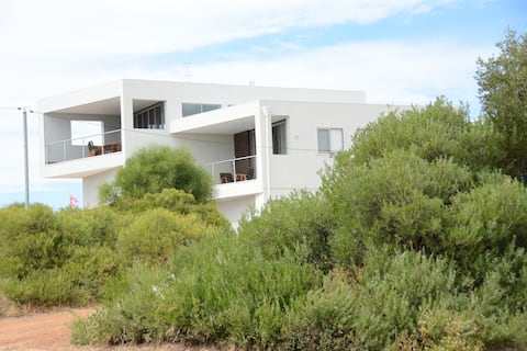 The Beach House - Holiday home with ocean views.