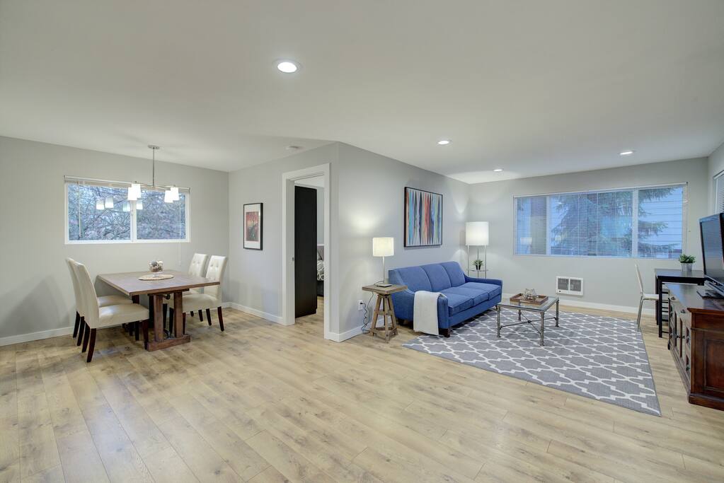 Open concept living and dining space. Recently updated with new flooring, lighting and paint.