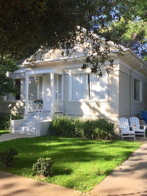 Our newly planted front lawn with Adirondack chairs for watching our friendly neighbors go by