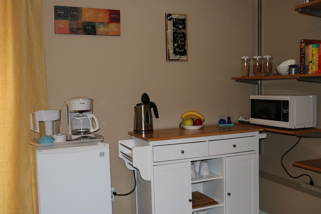 Kitchenette area, fully stocked.
