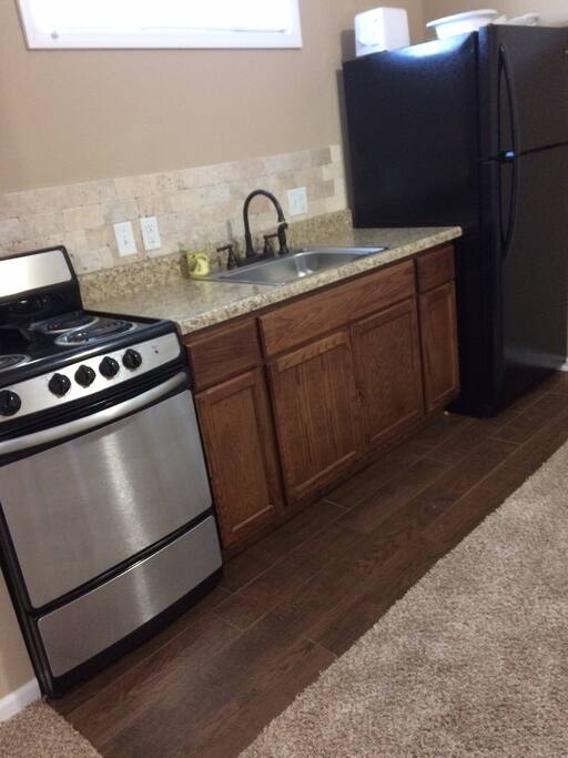 Fully functional kitchen with dining area
