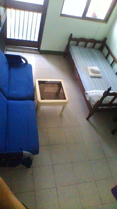 A navy blue sofa (3-Person)