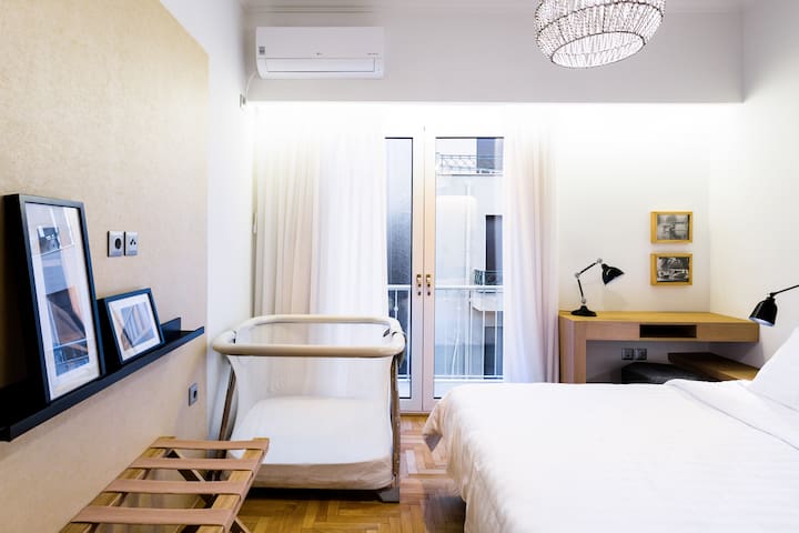 Powder-pink City Vistas from the Balcony at a Minimal Haven gallery image 3