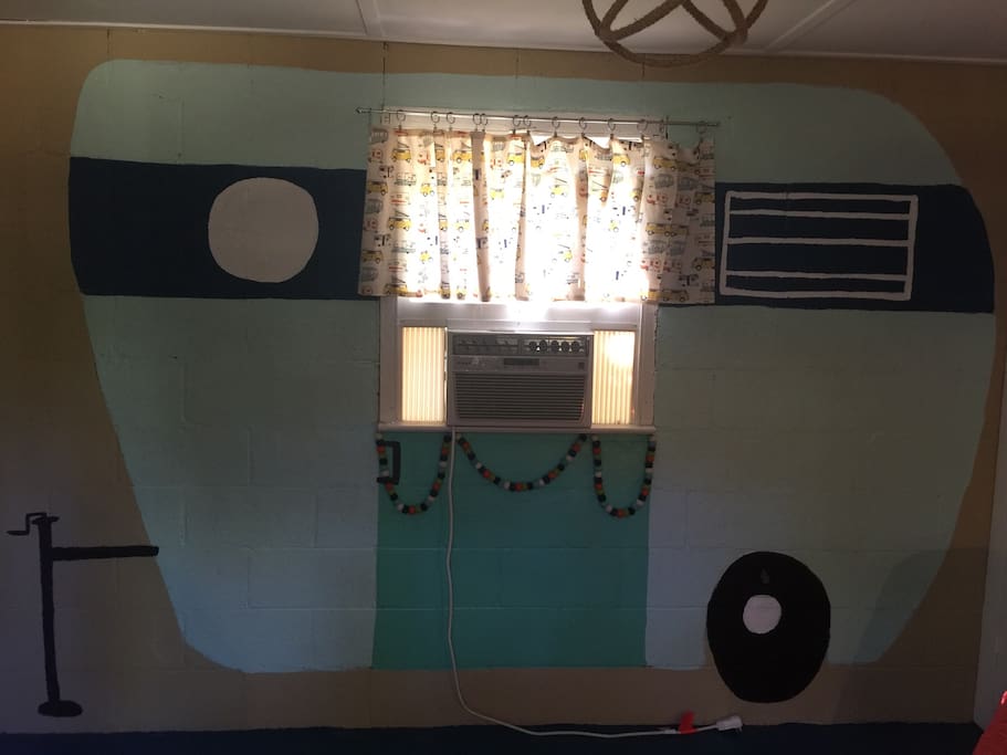 Adorable "glamping" theme. Pretend you are nestled warmly in an apartment style camper.