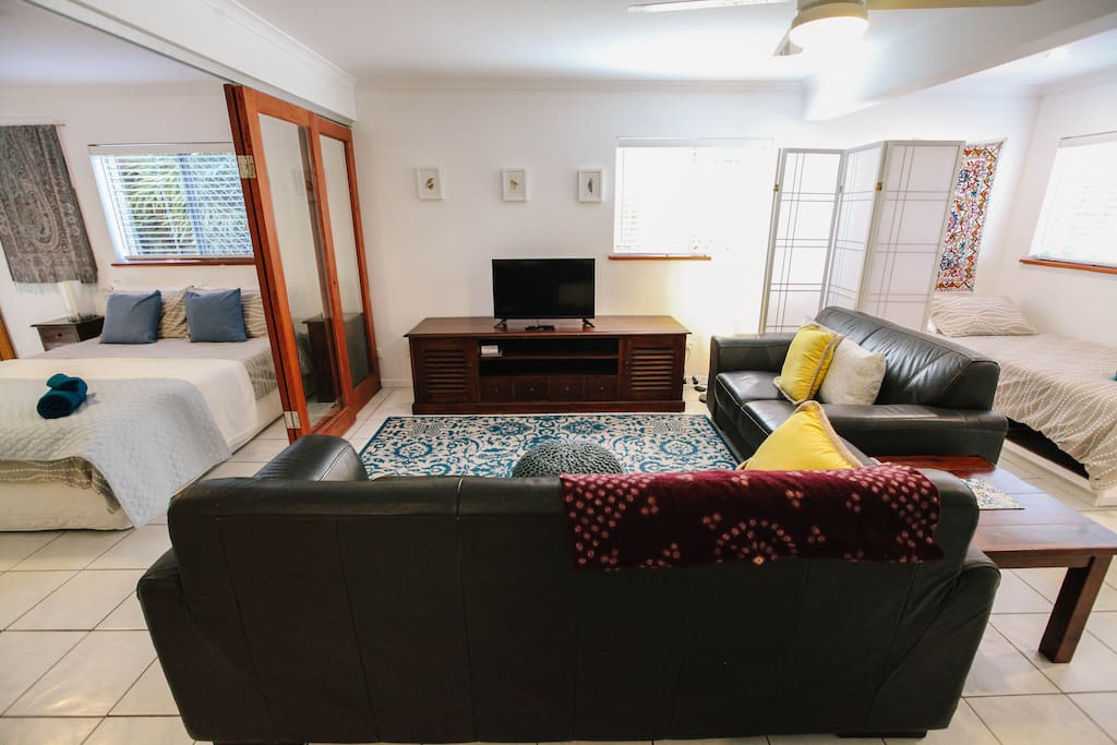 Comfy lounge area with TV, DVD player, ChromeCast Dongle, air con & ceiling fan