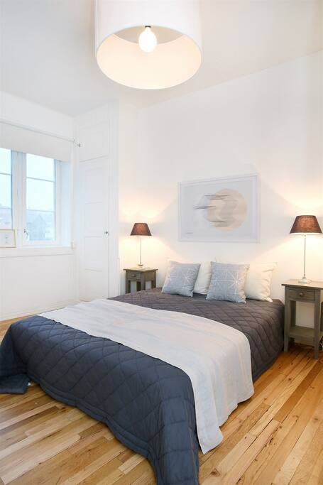 Master bedroom with a king size bed