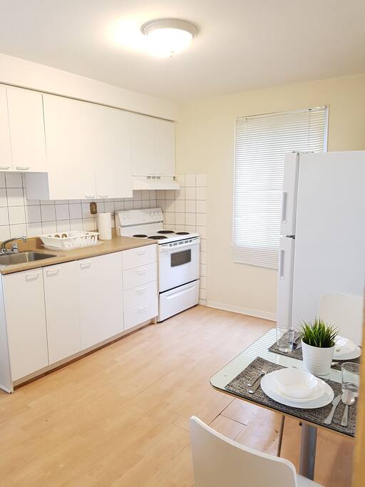 THE KITCHEN IS FULLY EQUIPED WITH PLATES, GLASSES, CUTLERY, DINNING TABLE, MICROWAVE, ETC.