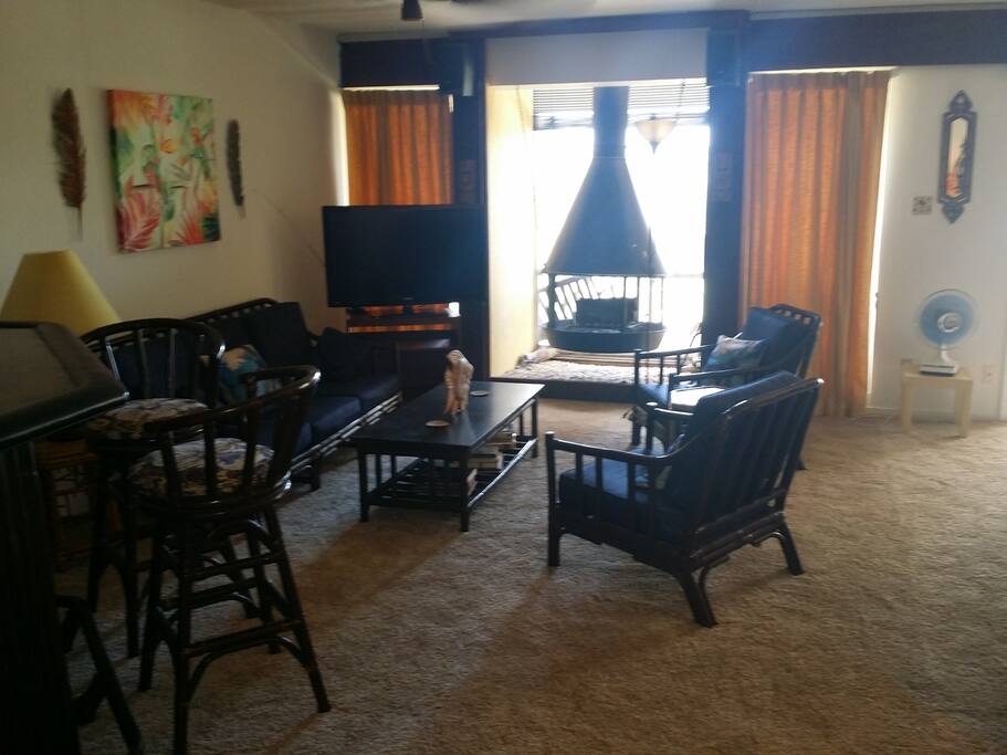 Living room, open to kitchen, view of lake travis.