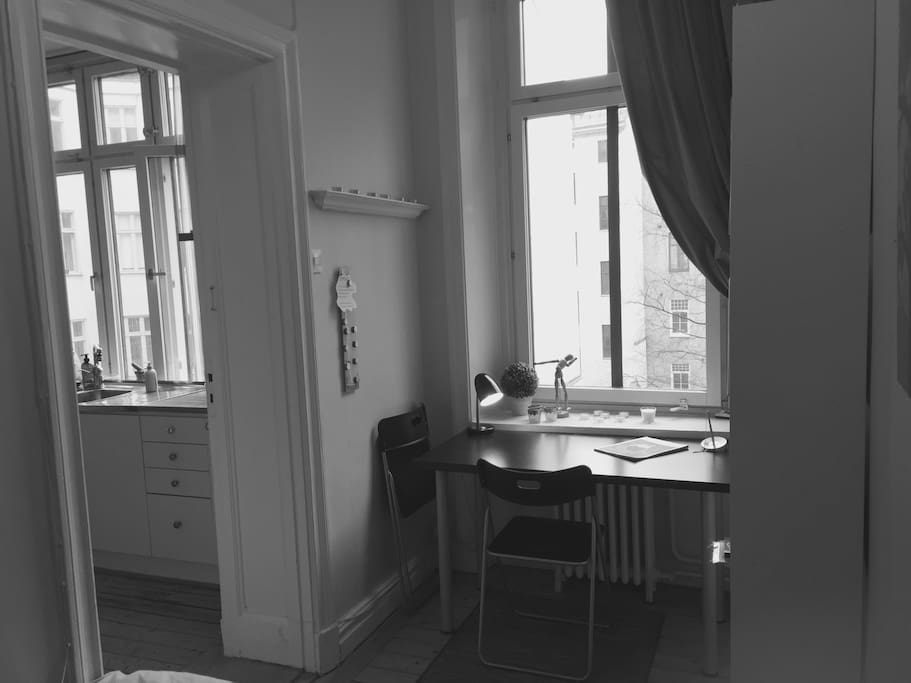 The desk with a quiet courtyard and your entry from the kitchen.