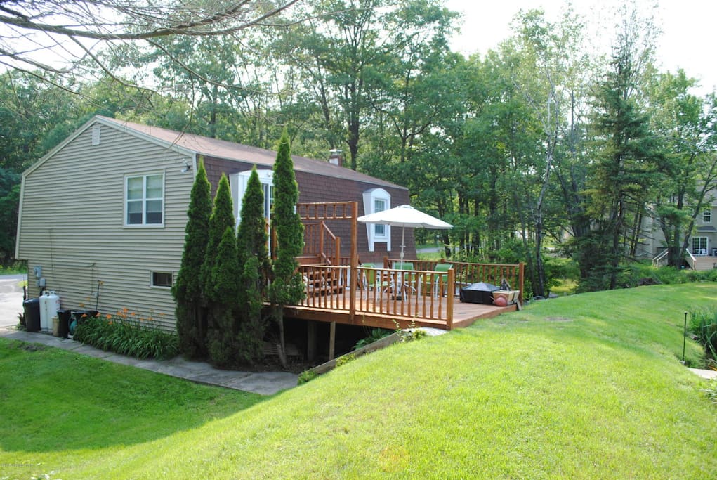 Large deck, a few yards from water...