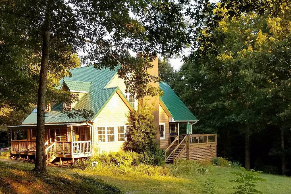 A view of the house coming up from the trail to the creek