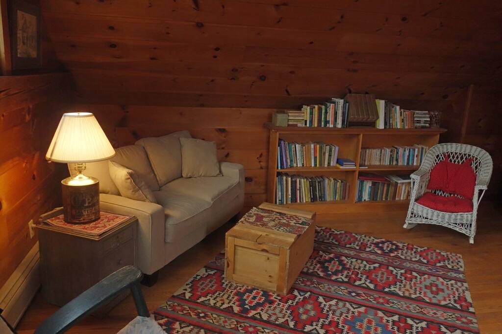 A cozy love seat is a perfect place to just kick back and relax,