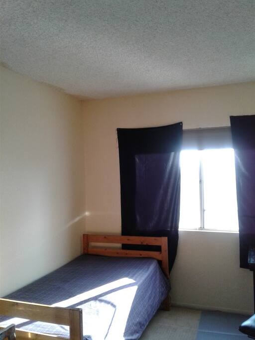 A cozy single bed for the simple, low maintenance person.