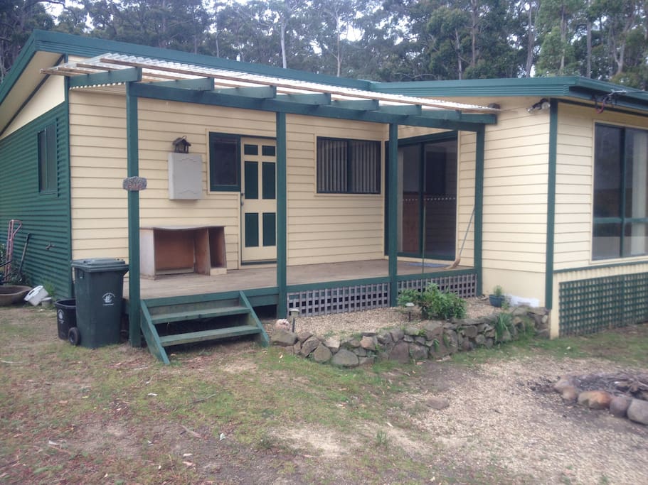Front of the house with small deck