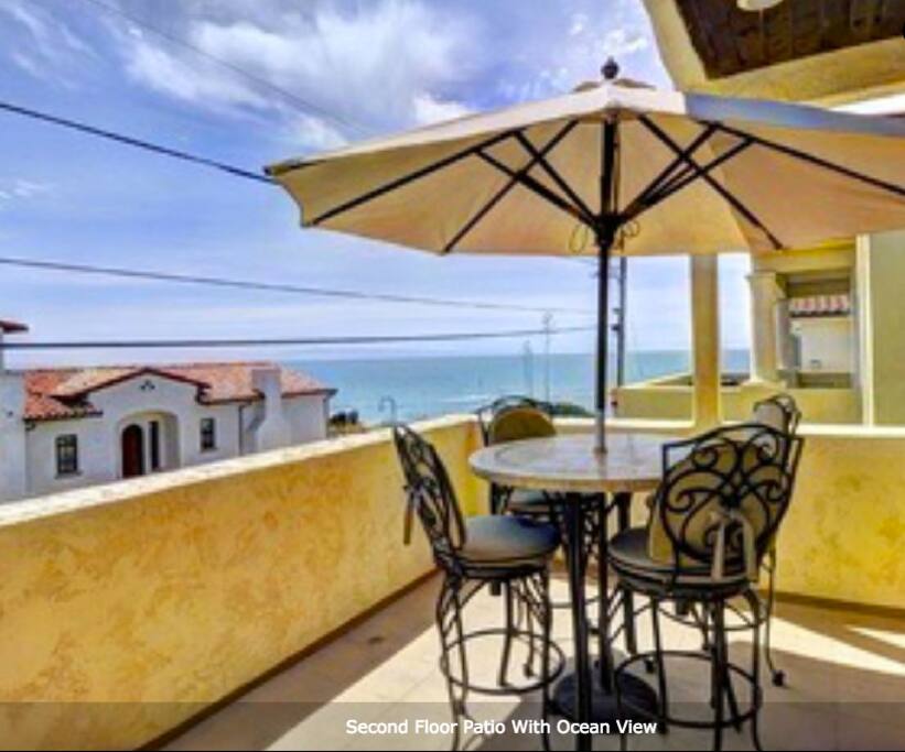 Second Floor Front Patio With a Gas BBQ
