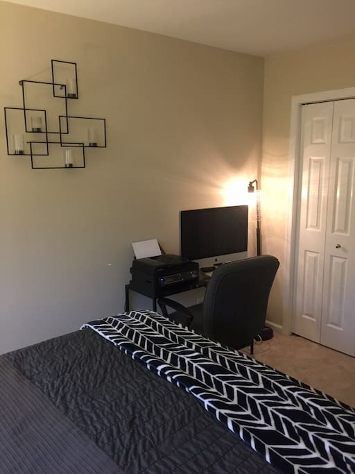 The desk is small but we can accompany your work and move the computer as you wish. If you need to hang up clothes items we are more than willing to allow you to use the closet. Just let us know!