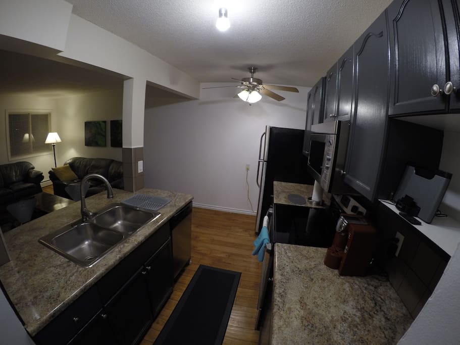 Open concept kitchen. With coffee maker.