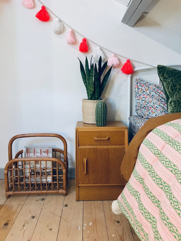 the 'nook' our little upstairs single bedroom. This room houses the boiler cupboard and has a slanted ceiling 