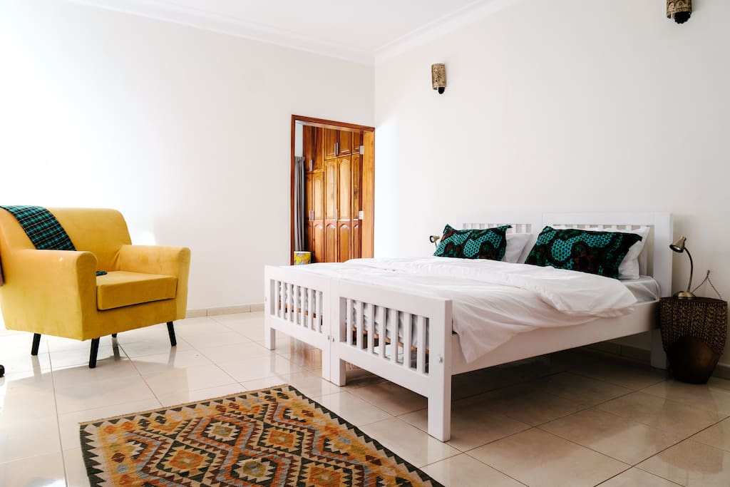 A bedroom (all rooms have fully fitted mosquito nets)
