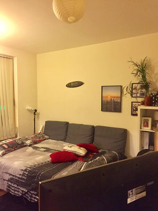 This is how the sofa with our comfy mattress does look like. Please note the two windows are just on the main road, which can be noisy sometimes.