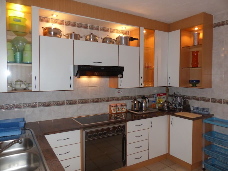 modern fully functional kitchen with granite tops
