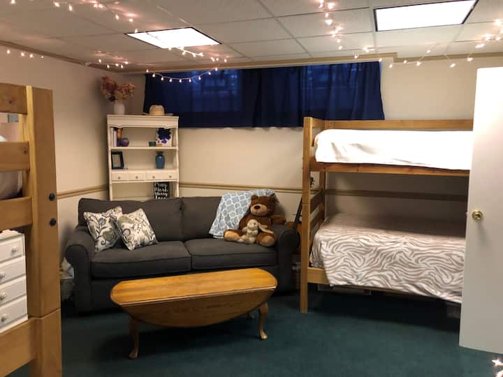 Basement bedroom - separate from the upper apartment.  For groups with more than 4 people. Note that there is one small bathroom for all guests, located in the upper apartment. After 4 people, we charge an additional $20/person/per night.
