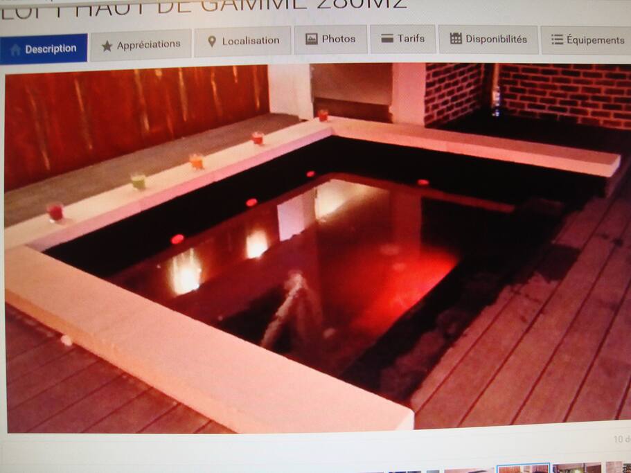 jacuzzi chauffé éclairé le soir