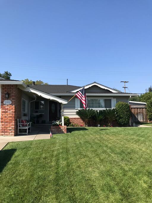 Gray house with white trim & shutters