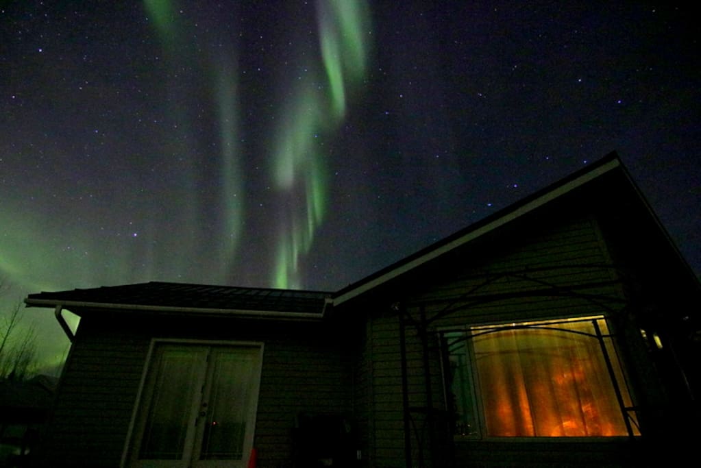 Welcome to Room Aurora. Step out of your private entrance to our deck and watch the lights.