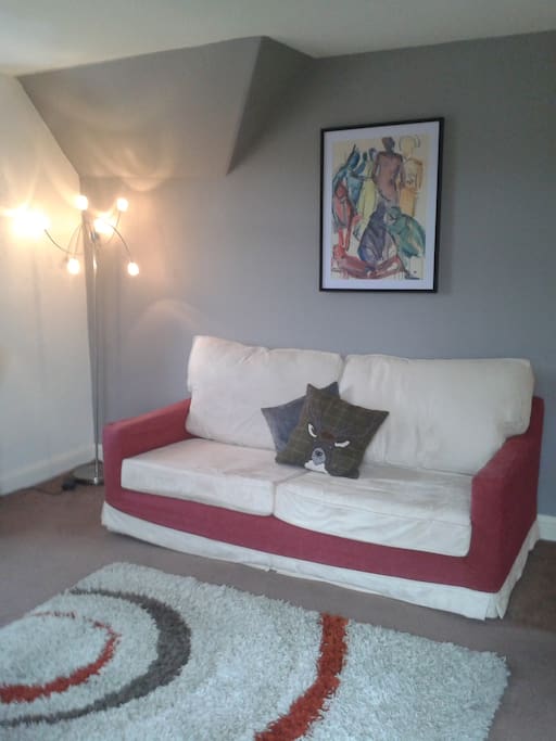 Large modern living room with freeview TV, dvd player and comfy seating.