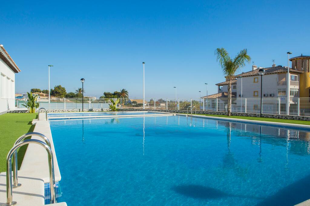 Swimming pool behind the appartment